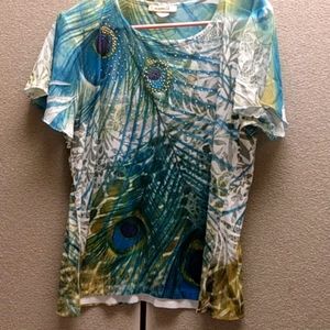 Emerald shirt Tag says size PKL